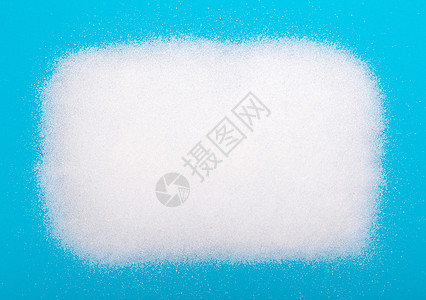 白糖背景颗粒剂宏观颗粒状白色碳水糖果水晶粒子活力蓝色图片