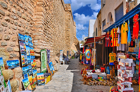 HAMMAMET 突尼斯2014年世贸会议 10月6日至2日举行的集市博览会脚凳橙子文化礼物艺术玻璃街道麦地马赛克店铺背景图片