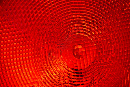 红色多面塑料的抽象背景反光板尾灯玻璃信号大灯弹射活力警告图片