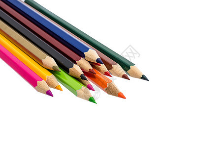 白色背景上孤立的彩色铅笔特写活力绿色蜡笔彩虹乐器光谱蓝色橙子绘画粉色图片