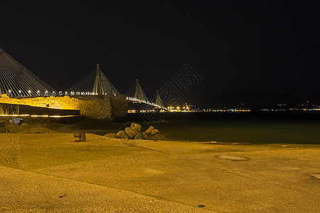 在希腊夜间看到里奥安蒂里奥桥废墟港口星星吸引力运输建筑码头光束场景石头图片