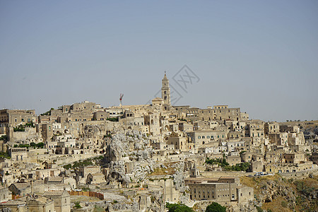 在 Matera  石头 上查看景观城市明信片旅游地标峡谷风景纪念碑建筑物窑洞图片