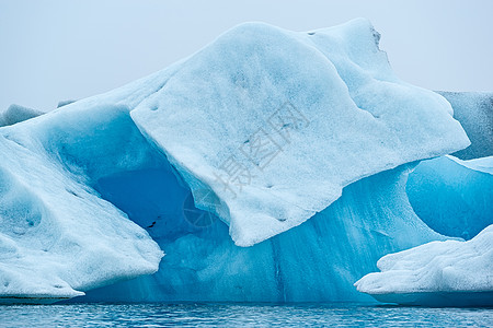 冰岛Jokulsarlon湖的冰山风景冰川白色旅行地标旅游蓝色水平天空图片