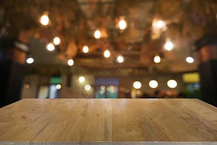 空木制桌 在抽象模糊的CO背景前架子店铺餐厅食物硬木咖啡广告零售厨房嘲笑图片