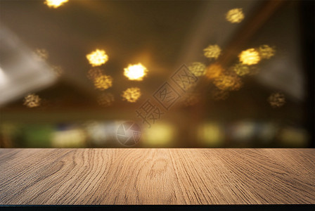 空木制桌 在抽象模糊的CO背景前零售购物中心架子咖啡建筑展示柜台商业咖啡店食物图片