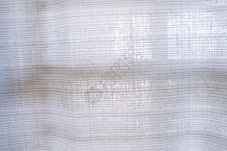 浅色布料浅色天然亚麻质地窗帘选择性聚焦背景床单帆布缠绕布料墙纸褐色抹布纤维灰色针织背景
