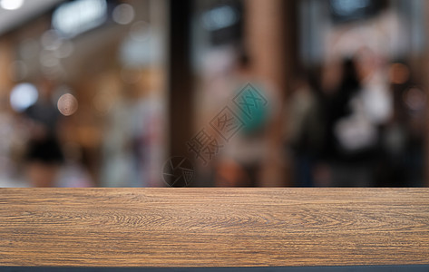 在抽象模糊bokeh背面的空暗黑木桌前g店铺命令木头广告咖啡购物中心房间建筑咖啡店桌子图片