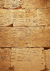 有古埃及象形文字的石墙砂岩雕刻旅行寺庙文化考古学宗教古董建筑学简写图片