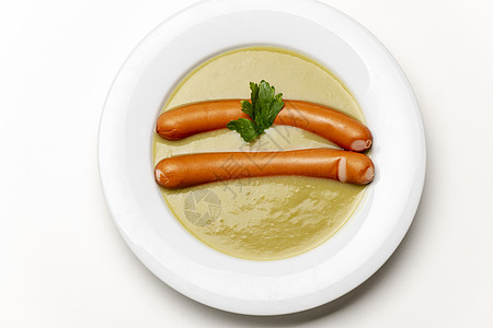 土豆汤 用坦率的言语白色绿色面包乡村盘子香肠饮食包子蔬菜奶油图片