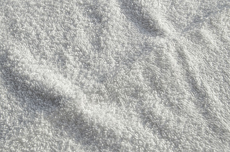 用于 SPA 治疗的白色特里软毛巾纹理背景质地波浪宏观纺织品家庭身体褶皱织物材料卫生图片
