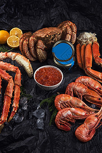套新鲜的海鲜柠檬午餐盘子贝类动物章鱼甲壳小龙虾菜单癌症图片