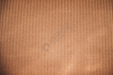 衣衫褴褛的硬纸板纹理背景在显示器上的特写工艺床单材料瓦楞棕色空白盒子木板图片