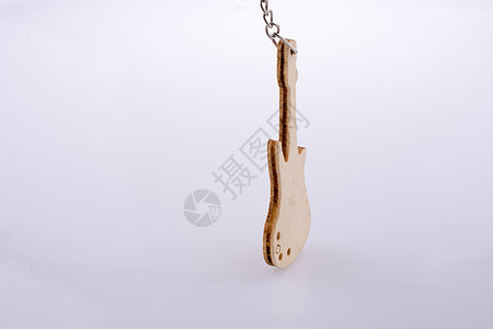 小型木制玩具吉他模型背景图片