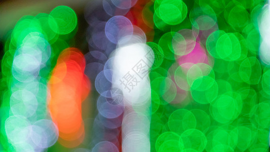 抽象的节日背景辉光墙纸绿色魔法耀斑星星白色圆圈图片