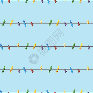 蓝色背景的衣绳上有彩色衣物钉 (照片由Flickr用户提供)图片