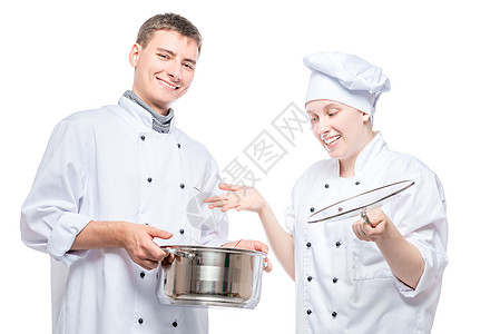 厨师的情感肖像 与一锅汤 在白色的背地上图片