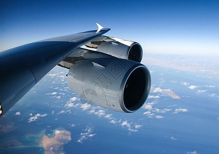 飞机飞行期间客机窗外的风景乘客航班假期航空公司窗户运输喷射旅行天线高度图片