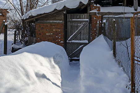 冬季大雪过冬后户外建筑破碎住宅区季节小路全景环境天气雪花生活房子童话图片