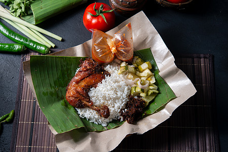 纳西莱马克库库斯盘子炒饭食物马来语烹饪牛奶黄瓜早餐小贩传统图片