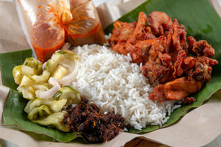 纳西库库斯油炸文化香气美味小贩传统马来语盘子雄鸡黄瓜图片