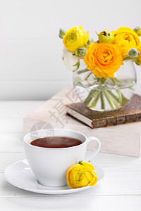 茶杯和鲜花叶子草本植物桌子茉莉花早餐花瓣玻璃茉莉药品杯子图片
