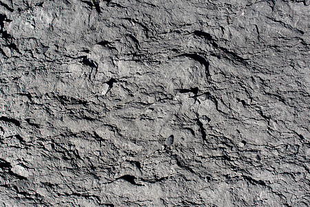 岩石或石头作为自然背景纹理地面地质学石灰石摇滚墙纸材料沉积灰色石板土壤图片