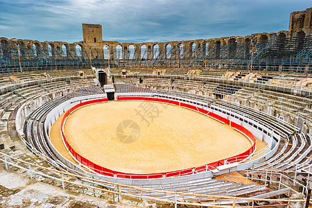 法国阿勒斯Arles的Arena和Roman两神剧院房子拱廊地标旅游斗牛建筑体育场废墟石头游客图片