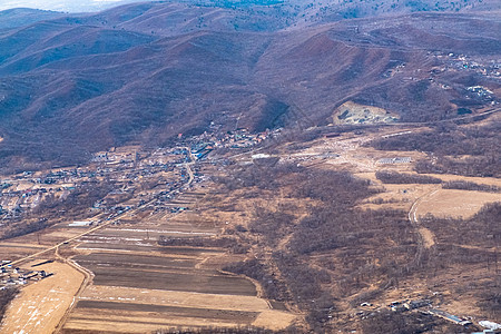 从阿尔特姆市郊的飞机上看到 普里莫尔斯基克赖飞机场旅行蓝色山脉地面环境土地农业天空风景图片