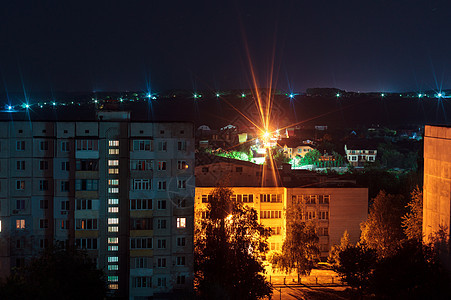 长夜照射照片9和10楼层高楼建筑以蓝色和橙色为颜色 这里是大城市生活!图片