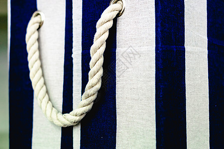 框中用画布 一个碎片蓝色缠绕电缆航海细绳海洋领带白色纤维棕色图片