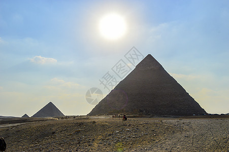 埃及的吉萨大金字塔埃及开罗 有斯芬克斯和骆驼人面旅行建筑学蓝色沙漠石头旅游日落考古学文明图片