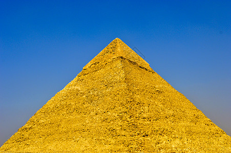 埃及的吉萨大金字塔埃及开罗 有斯芬克斯和骆驼游客文明全景法老废墟历史狮身旅游雕像蓝色图片