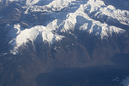 瑞士阿尔卑斯山高雪山顶蓝色天空顶峰爬坡航班岩石旅行滑雪山脉飞行图片