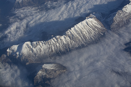 瑞士阿尔卑斯山高雪山顶航班山脉风景飞行天线滑雪旅行岩石天空森林图片