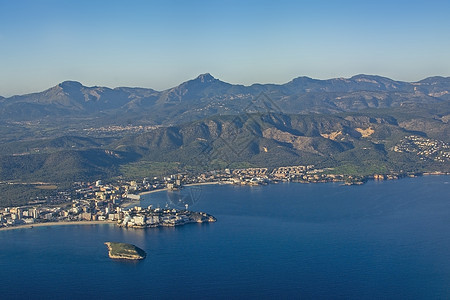 西班牙马洛尔卡海风海岸景观海浪港口阳光岩石海岸线蓝色旅行海洋石头天空图片