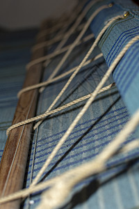 缩放部件和线索特写生产制造业织物筒管工作编织棉布羊毛乡村木头图片