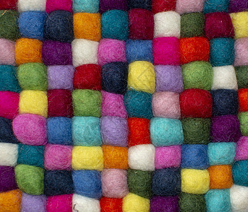 充满多姿多彩的触觉的小球材料手工织物羊毛蓝色地毯墙纸纤维地面毛毡图片