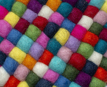 充满多姿多彩的触觉的小球毛毡纺织品羊毛柔软度蓝色材料墙纸纤维小地毯地面图片