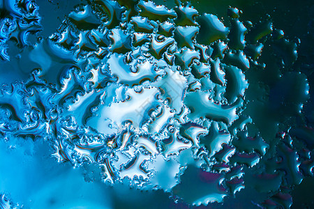 背景覆盖着水滴在特写你波纹环境水珠宏观液体反射生活水分圆形玻璃图片