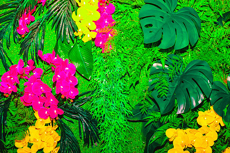 由人工材料制成的鲜花构成的背景背景成分模仿草地紫色花序字母花束植物植物群花瓣兰花图片