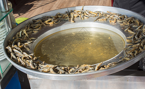 托盘准备炸鱼凤尾鱼油炸小吃食物灰色美食塔瓦海鲜盘子饮食午餐图片