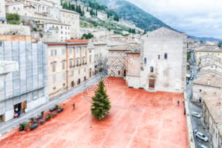 位于Gubbio的主要广场的背景分散教会控制台宫殿城堡城市建筑旅行建筑学日落全景图片
