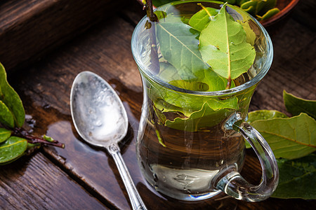 美味的草药茶饮料芳香液体茶杯玻璃砂浆乡村杯子花草放松图片