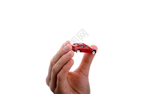 持有一辆红色车的儿童手车辆人手交通汽车驾驶运输保险图片