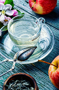 苹果果茶乡村绿茶饮食水果芳香饮料叶子食物玻璃桌子背景