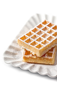 比利时在陶瓷板上用糖粉涂抹的瓦片面包陶瓷甜点午餐粉末制品糕点盘子早餐食物图片