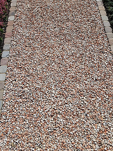 棕色鹅卵石背景的图像花园海滩温泉白色材料灰色圆形卵石宏观岩石图片