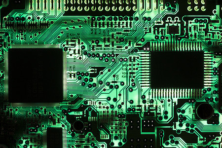 Backlit绿色印刷电路板多氯联苯纹理母板小路工程芯片组宏观电气打印处理器芯片半导体图片