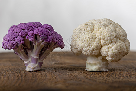 紫色花椰菜的特写桌子插图红色食物健康植物力量蔬菜白色图片