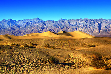 卡利福恩死亡谷国家公园 海脊和山峰天空日出涟漪沙波风蚀山脉侵蚀沙丘沙漠公园图片